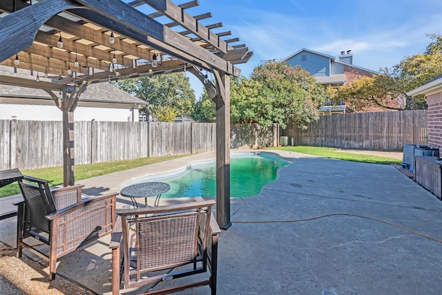 view of pool with a pergola and a patio