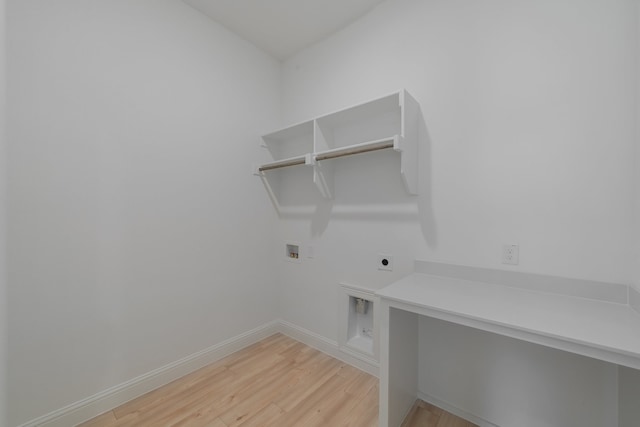 laundry room with hookup for an electric dryer, light wood-type flooring, and hookup for a washing machine