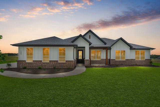 view of front of house with a lawn