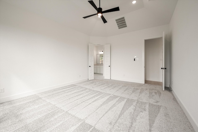 unfurnished room with light colored carpet and ceiling fan