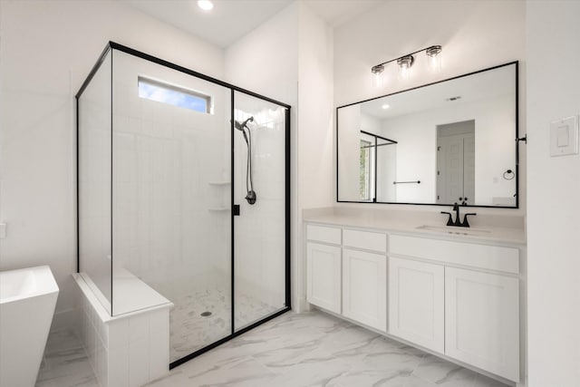 bathroom featuring vanity and plus walk in shower