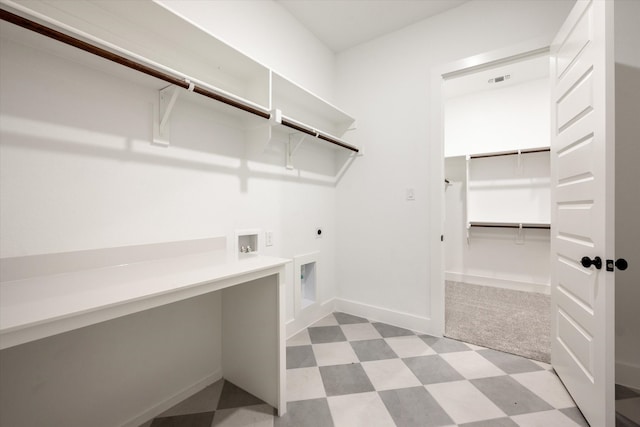 laundry room featuring washer hookup and hookup for an electric dryer