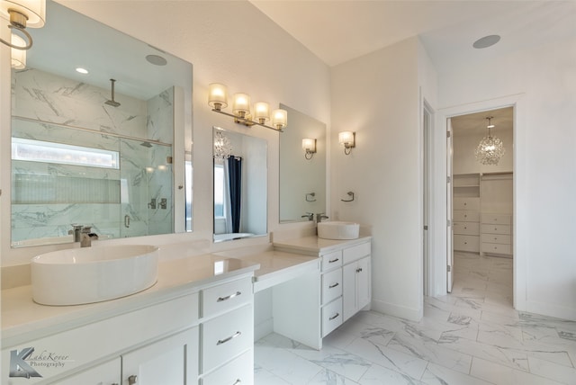 bathroom featuring vanity and a shower with shower door