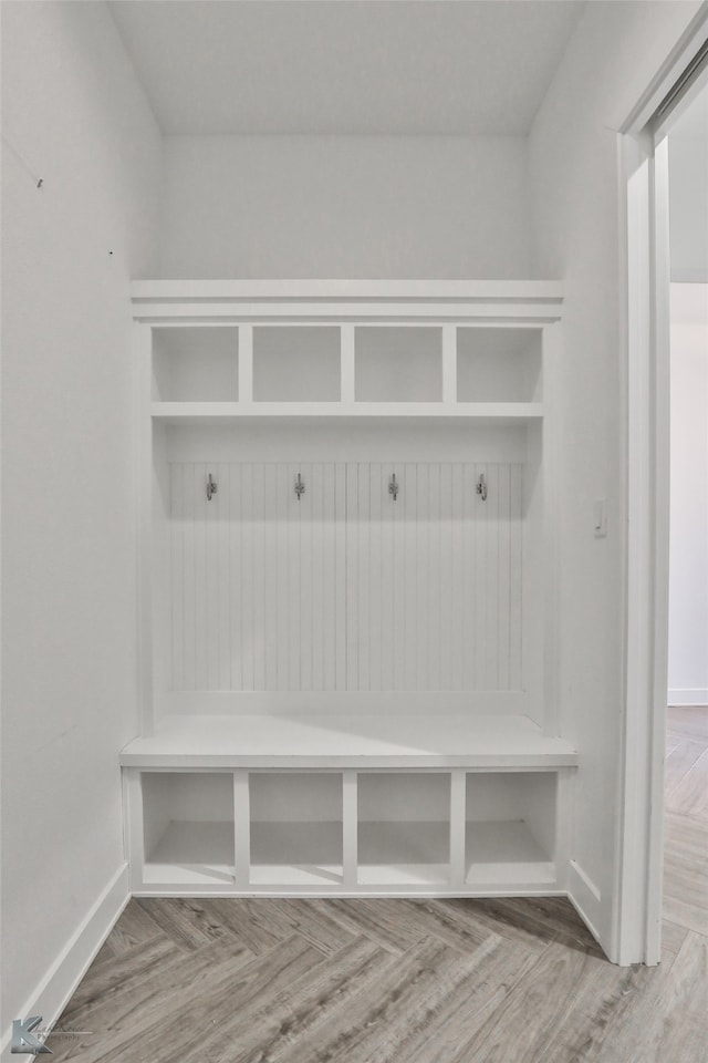 mudroom featuring wood-type flooring