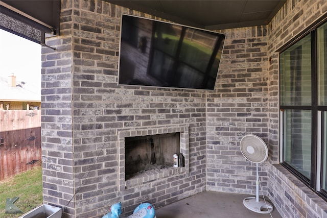 view of patio / terrace featuring a fireplace