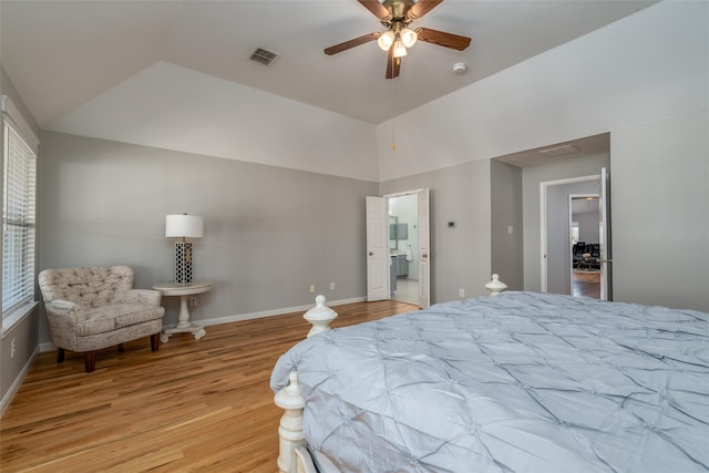 bedroom with vaulted ceiling, light hardwood / wood-style flooring, and ceiling fan