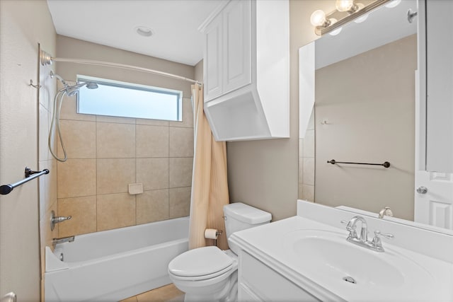 full bathroom with tile patterned floors, vanity, toilet, and tiled shower / bath