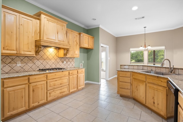 kitchen featuring dishwasher, sink, hanging light fixtures, stainless steel gas stovetop, and ornamental molding