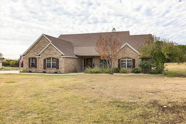 view of front of home with a front yard