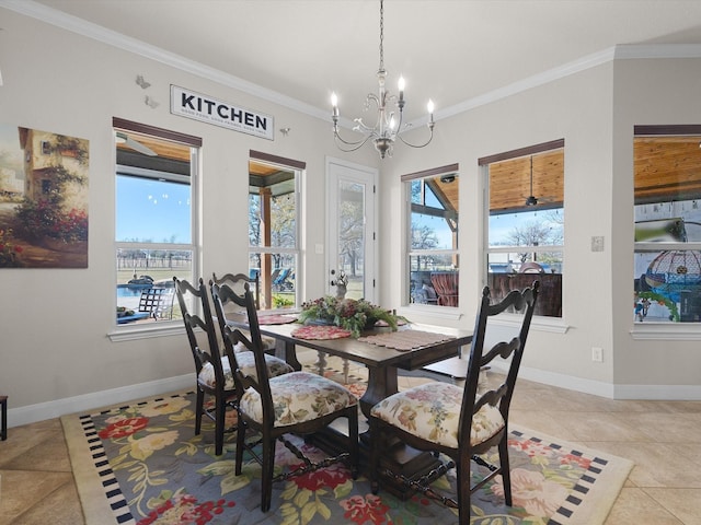 dining space with a wealth of natural light and crown molding