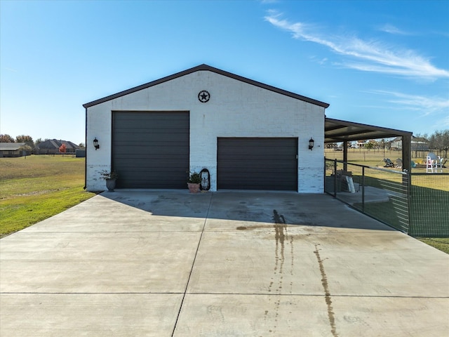 garage with a lawn