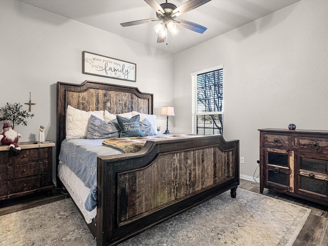 bedroom featuring hardwood / wood-style flooring and ceiling fan