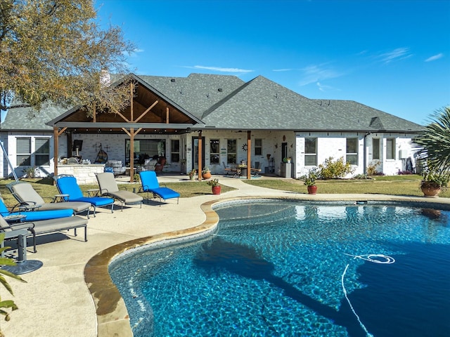 view of pool featuring a patio area