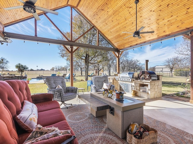 view of patio / terrace featuring area for grilling, ceiling fan, outdoor lounge area, and grilling area