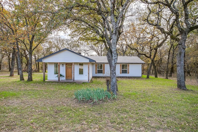 ranch-style house with a porch and a front yard