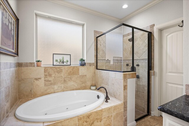 bathroom with vanity, separate shower and tub, and ornamental molding