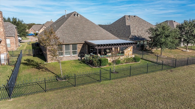 rear view of house featuring a fenced backyard, a yard, roof with shingles, a pergola, and a patio area