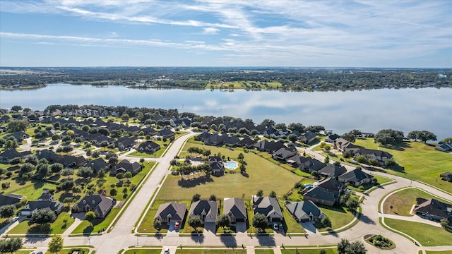 bird's eye view with a water view and a residential view