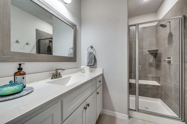 bathroom with vanity and walk in shower