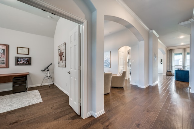 corridor with crown molding and dark wood-type flooring