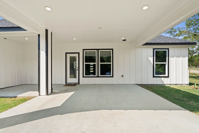 doorway to property with a patio area