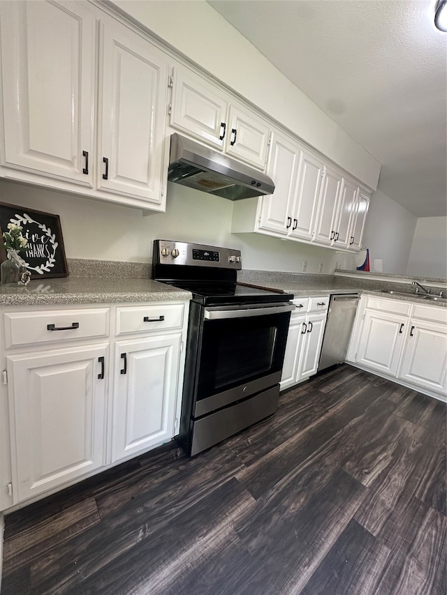 kitchen with white cabinetry, appliances with stainless steel finishes, sink, and dark wood-type flooring