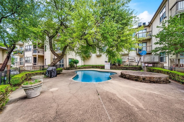 view of pool featuring a patio area