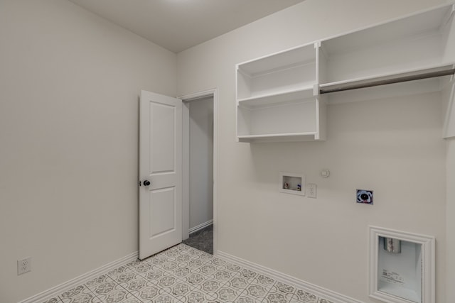 clothes washing area featuring hookup for an electric dryer, hookup for a gas dryer, light tile patterned floors, and washer hookup