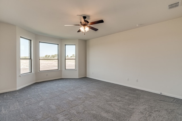 carpeted empty room with ceiling fan