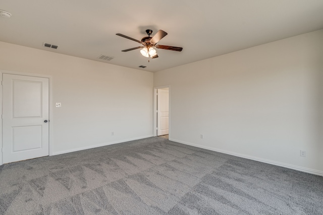 empty room with carpet flooring and ceiling fan