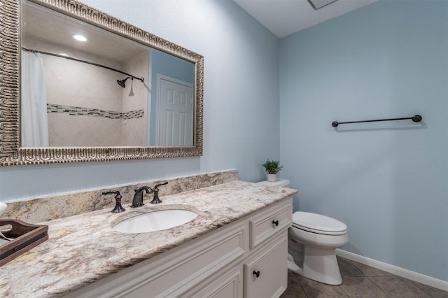 bathroom featuring vanity, tile patterned flooring, curtained shower, and toilet