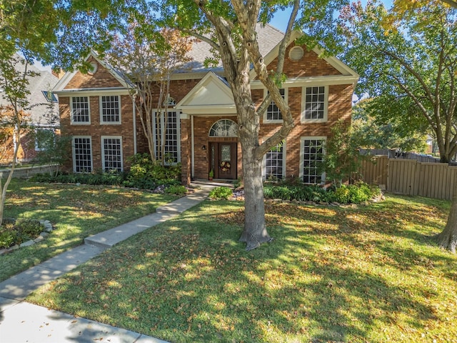 view of front facade with a front lawn