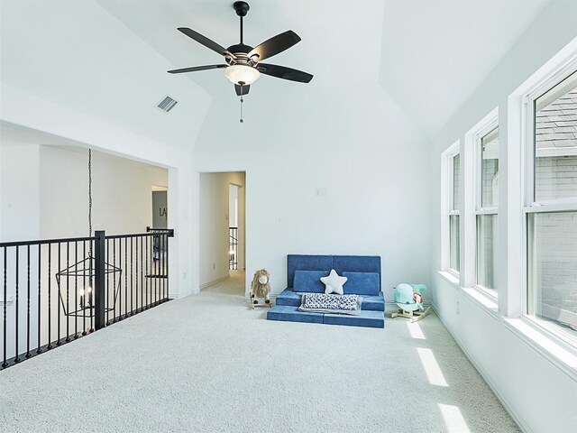 sitting room featuring carpet, high vaulted ceiling, and ceiling fan