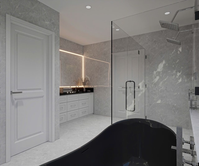 bathroom featuring shower with separate bathtub and tile walls