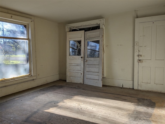 foyer entrance with light hardwood / wood-style floors