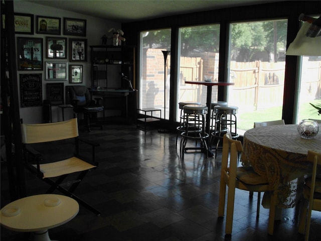 dining space with vaulted ceiling