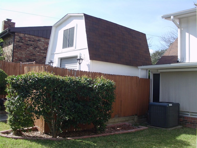 view of property exterior featuring central AC unit