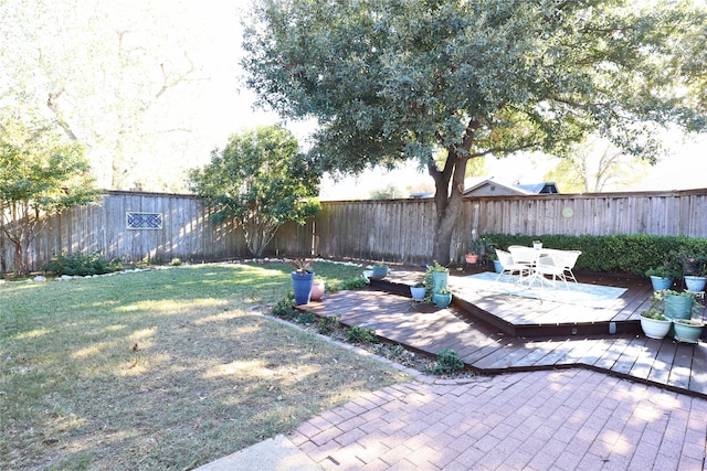 view of yard with a deck