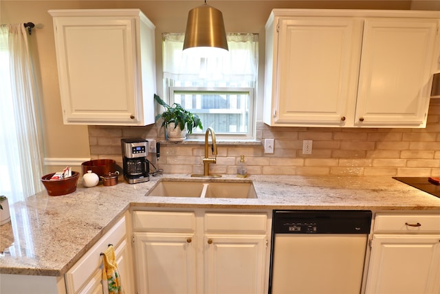 kitchen with sink, white cabinets, and dishwasher