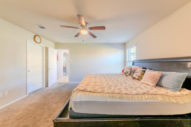 carpeted bedroom featuring ceiling fan