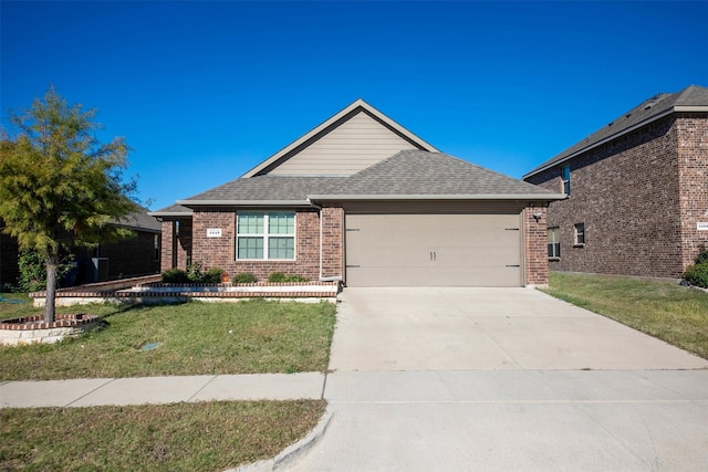 ranch-style home featuring a garage and a front yard