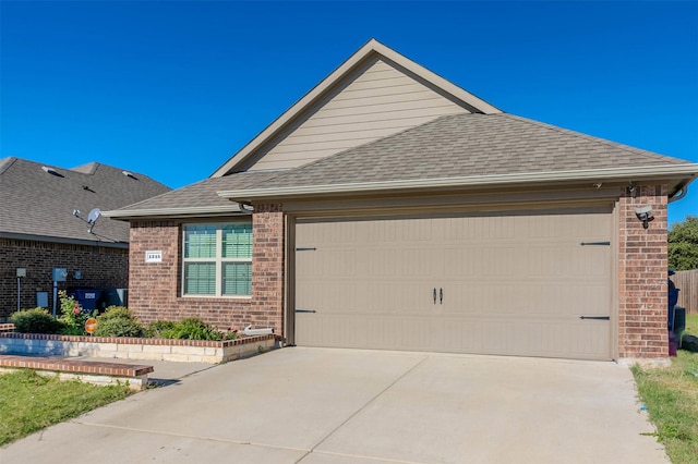 ranch-style house featuring a garage