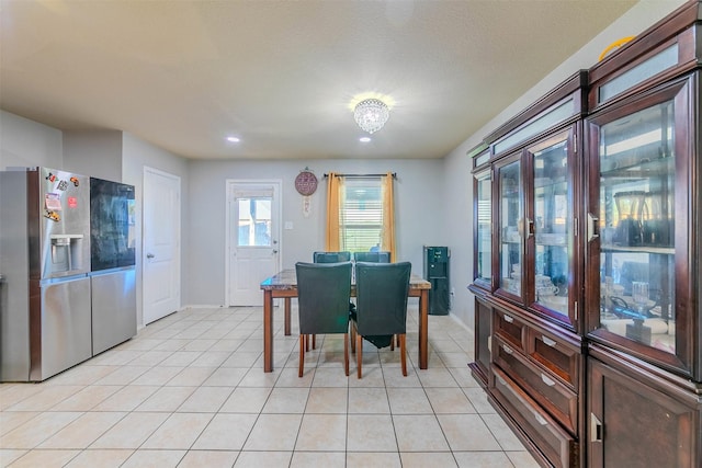 dining room with light tile patterned floors