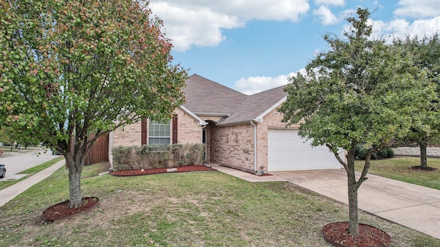 view of front facade with a garage, driveway, a front yard, and brick siding