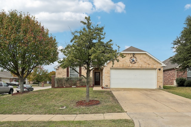 view of front of house featuring a garage and a front lawn