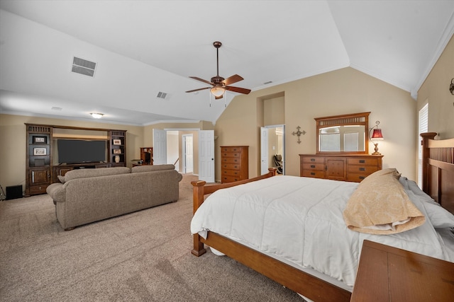 carpeted bedroom featuring ceiling fan, crown molding, and vaulted ceiling