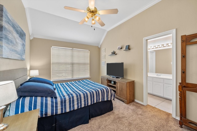 bedroom with light carpet, ornamental molding, ceiling fan, connected bathroom, and lofted ceiling