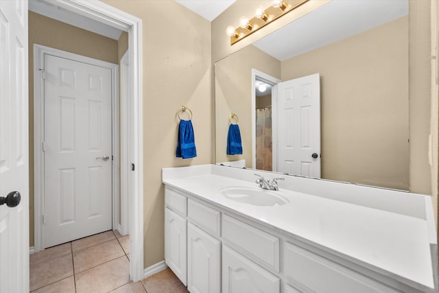 bathroom featuring tile patterned floors and vanity