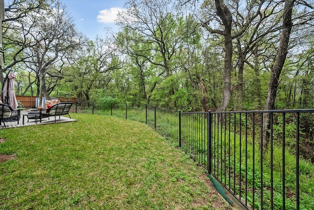 view of yard with an outdoor living space and a patio