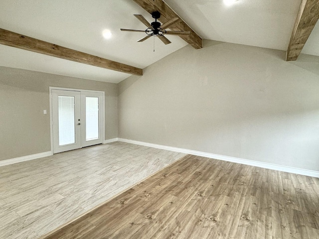 unfurnished room featuring french doors, lofted ceiling with beams, light hardwood / wood-style floors, and ceiling fan